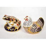 ROYAL CROWN DERBY; two Imari decorated porcelain animal paperweights,