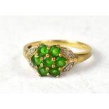 A 9ct gold Russian diopside and diamond floral cluster ring, size N/O, approx 2.7g.