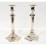 An impressive pair of Victorian 19th century hallmarked silver candlesticks,