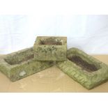 Three carved stone trough planters,