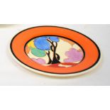 CLARICE CLIFF; a 'Pastel Autumn' pattern side plate, hand painted with stylised tree,