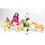 A Royal Doulton figure HN3298 'Hold Tight', a Coalport figure, a Beswick model of a Jersey cow,