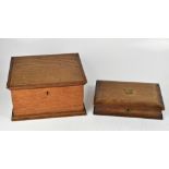 Two oak boxes, one writing box in the form of a book with pen holder, removable tray, ink holder,