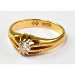 A gentlemen's 18ct gold diamond signet ring with central claw set diamond, approx 0.