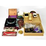 A quantity of costume jewellery to include earrings, brooches, Egyptian-style jewellery, bracelets,