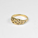 A vintage 9ct gold ring with Celtic ropework, on a 9ct yellow gold shank, size P, approx 2g.