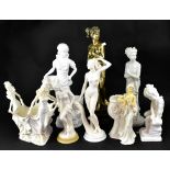 Eight decorative Parian ware and mixed media figures of ladies in various states of undress,