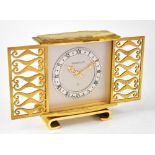 JAEGER-LECOULTRE; a gilt brass mantel clock,