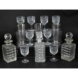 A large quantity of clear pressed and cut glass, to include tableware, drinking glasses,