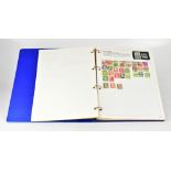 A Boots blue stamp album of British and world stamps, mostly in the reign of Elizabeth II,