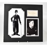 CHARLIE CHAPLIN; a piece of paper bearing the acting superstar's signature and date 1933,