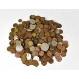 A quantity of mixed coins to include mostly pre-decimal British examples and some world coins.