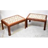 A pair of mid-20th century teak tile-topped side tables,