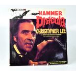 DRACULA; an album from the film bearing several signatures, including that of Christopher Lee.