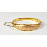 A Victorian-style 9ct gold hinged bracelet,