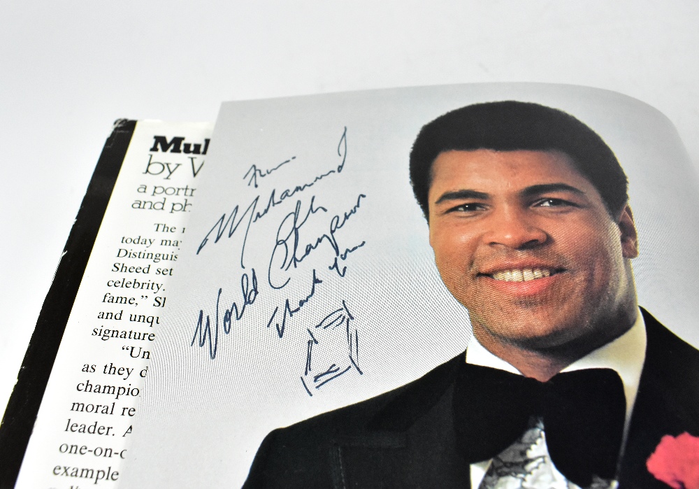 MUHAMMAD ALI; a single volume bearing the signature of the boxing megastar twice, one dated 1976. - Image 2 of 3