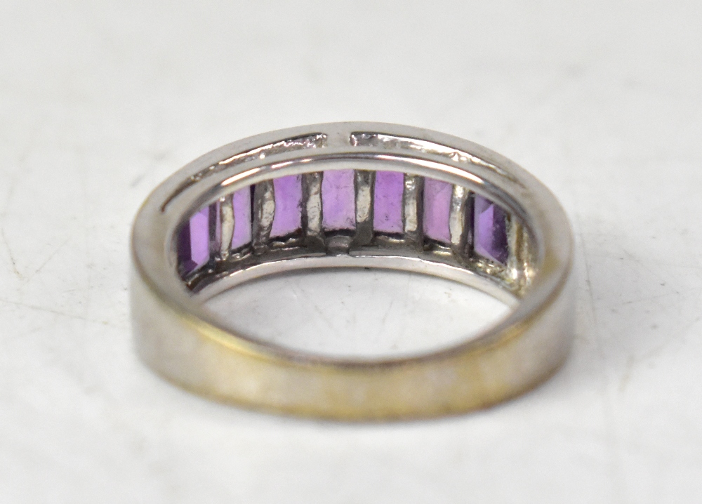 A modern 9ct white gold ring, pavé set with seven emerald cut amethyst stones, size O, approx 4.4g. - Image 3 of 3