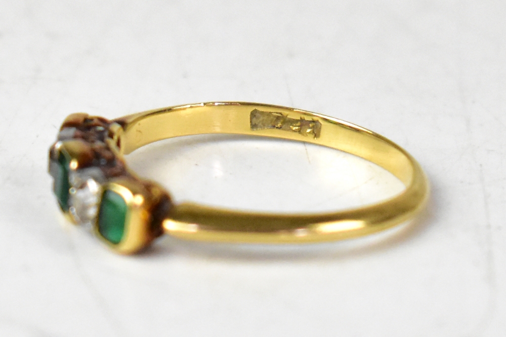 An 18ct yellow gold five-stone ring set with alternating emerald cut emeralds and rose cut diamonds, - Image 2 of 3