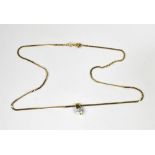 A 9ct gold flat link necklace, length approx 40cm, with a white stone pendant in a 9ct gold mount,