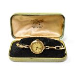 ROTARY; a cased ladies' vintage 9ct gold wristwatch, with circular dial and crown wind movement,