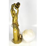 An Art Deco style table lamp modelled as a nude young woman holding aloft a globular shade,