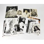 FILM ACTORS; a group of fifty photographs bearing stars' signatures, including Elizabeth Taylor,