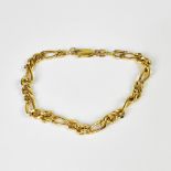 A 9ct gold figaro link bracelet with lobster claw clasp, length approx 18cm, approx 3.7g.