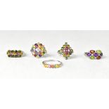 Five multicoloured gemstone set sterling silver rings,