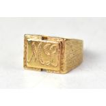A gentlemen's heavy 9ct gold signet ring, the central panel with initials 'ML',