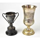 A mid/late 19th century silver Austro-Hungarian footed beaker with vacant cartouche within a floral