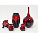 ROYAL DOULTON; five pieces of flambé ware to include seated bulldog, onion vase with Arab scene,
