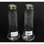 An early 20th century matched pair of cut glass vases, cylindrical body with flared bottom,