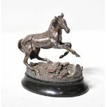 A Geoffrey Snell silver horse figure on marble/slate oval base,