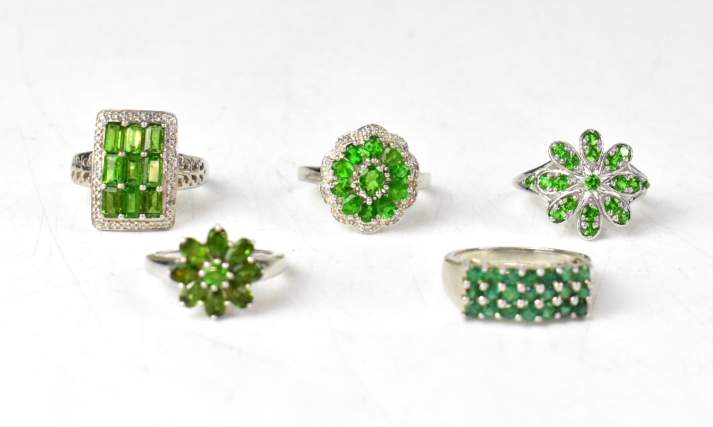 Five emerald and chrome diopside rings,