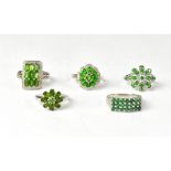 Five emerald and chrome diopside rings,
