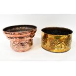 An Arts and Crafts brass planter with repoussé floral decoration, diameter 25cm,