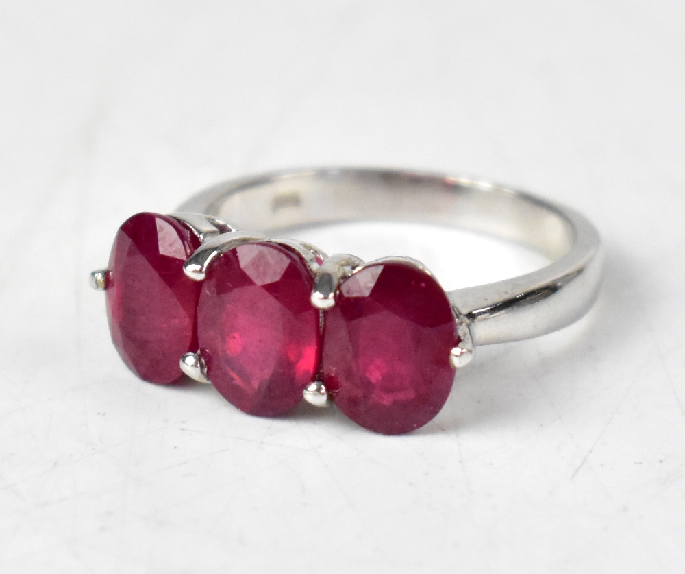 Five hallmarked sterling silver rings, comprising a ruby, sapphire and diamond ring, - Image 5 of 6