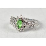 A 9ct white gold ring set with Tsavorite and white topaz ring, size O, approx 3.4g.
