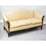 A 19th century mahogany framed three-seat settee, with scroll arms and serpentine back,