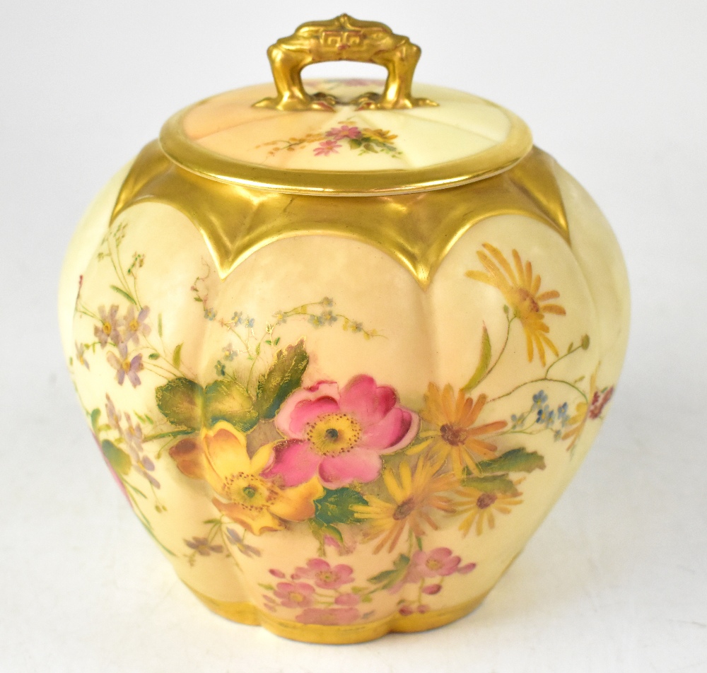 ROYAL WORCESTER; a blush ivory floral decorated globular jar and cover,