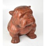 A large terracotta model of a seated English bulldog, height 38cm.