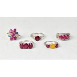 Five hallmarked sterling silver rings, comprising a ruby, sapphire and diamond ring,