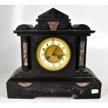 A late 19th century French black slate mantel clock, with eight day movement,