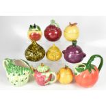 Approximately twenty-five vegetable and fruit lidded preserve pots,