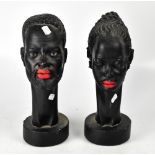 A pair of resin busts with red painted lips, height of each 36cm (one af) (2).
