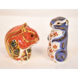 ROYAL CROWN DERBY; two Imari decorated porcelain animal paperweights, comprising a chipmunk,