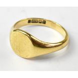 A gentlemen's vintage 9ct gold signet ring, with a plain top, size O/P, approx 3.7g.