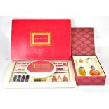 A boxed Ralph Laurent Safari set of perfume to include a large ovoid bottle with silver top and
