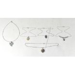 Five sterling silver and gem set necklaces comprising an Ethiopian opal and iolite oval pendant on
