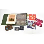 A large collection of coins comprising Brilliant Uncirculated British coins, to include 1985, 1986,